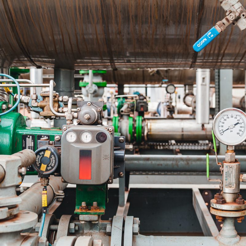 Industrial gas system with pipelines, valves and pressure gauges, representing OEM gas detection using dual‑gas NDIR sensors for industrial safety monitoring.